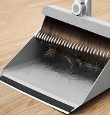 Stainless Steel "Built-In Comb" Rotating Broom.